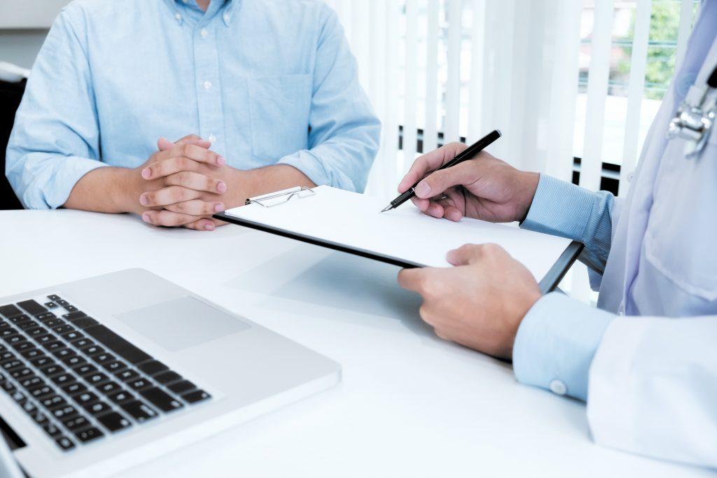 Doctor Discussing Lasting Power of Attorney with Patient